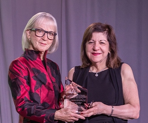 Anna D. Barker, PhD (left), chief strategy officer of the Lawrence J. Ellison Institute for Transformative Medicine. Dr. Barker was recognized for her leadership of the AACR Scientist↔Survivor Program.