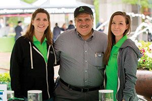 Lou Lanza stands with AACR staff members Joanna Guttridge, left, and Erin O’Connell at All Star Day Live  on May 24, 2017. 