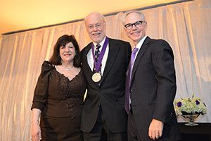 Dr. Phillip A. Sharp stands with Dr. Margaret Foti, AACR Chief Executive Officer, and Dr. Charles L. Sawyers, AACR President 2013-2014, after becoming a Fellow of the AACR Academy as part of the inaugural class in 2013. Photo © AACR/Alan Lessig 2013