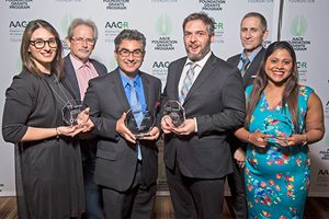 Recipients of AACR-Novocure Tumor Treating Fields Research Grants gather at the 2019 AACR Annual Meeting Grants Dinner on April 2, 2019. From left, Francesca Anna Carrieri, PhD; Michael D. Story, PhD; Emil Lou, MD, PhD; Alexander Rubinsteyn, PhD; Moshe Giladi, PhD, MBA, director of preclinical research, Novocure; and Preshita Desai, PhD. 