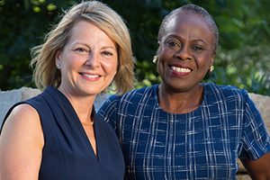 Dr. Olufunmilayo Olopade stands with Kristen Vitale, a breast cancer patient at University of Chicago Medicine. Photo © Anne Ryan.