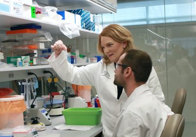 Dr. Elaine R. Mardis and genetic technologist Anthony Miller, PhD, discuss the purification of RNA from pediatric cancer samples. Dr. Mardis and Dr. Miller are shown in the laboratory of the Institute for Genomic Medicine at Nationwide Children’s Hospital in Columbus, Ohio.