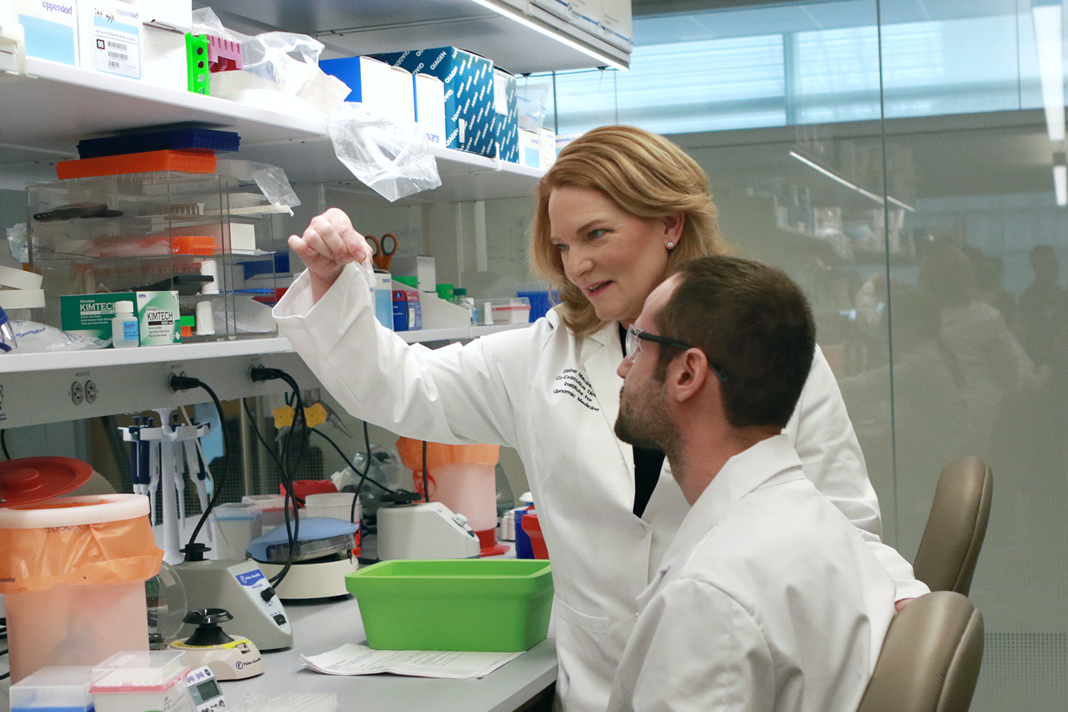 Dr. Elaine R. Mardis and genetic technologist Anthony Miller, PhD, discuss the purification of RNA from pediatric cancer samples. Dr. Mardis and Dr. Miller are shown in the laboratory of the Institute for Genomic Medicine at Nationwide Children’s Hospital in Columbus, Ohio.
