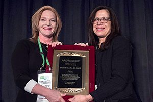 Dr. Elaine R. Mardis presents a plaque to Dr. Elizabeth M. Jaffee during the AACR Annual Meeting 2019 in Atlanta. The plaque expressed gratitude for Dr. Jaffee’s extraordinary leadership as AACR president in 2018-2019. Dr. Mardis succeeded Dr. Jaffee as the 2019-2020 AACR president. 