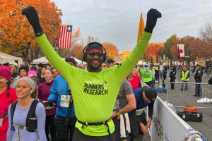 Mamadou Ba, part of the AACR Runners for Research team, celebrates after completing the AACR Philadelphia Marathon on Nov. 18.