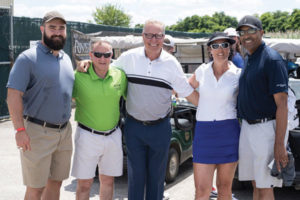 The 2017 Scramble Fore Research golf outing benefited the AACR and the Sidney Kimmel Cancer Center at Thomas Jefferson University in Philadelphia. Among those attending were, from left, Jason Kelce of the Philadelphia Eagles; Mitch Stoller, AACR Foundation Executive Director; Ron Jaworski, former NFL quarterback and a football analyst on ESPN; Dr. Karen Knudsen, Director, Sidney Kimmel Cancer Center, Thomas Jefferson University; and Ukee Washington, co-anchor on KYW-TV.